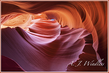 This is the thumbnail for my U.S.A. gallery. It is a photo of the walls of a stunning slot canyon with a sliver of blue sky above.