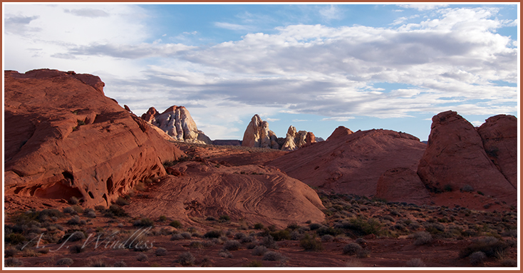 Monoliths seem to create an inviting corridor as the sun begins to set in The Valley of Fire.