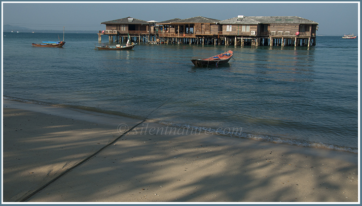 Thai houses sit atop stilts over a hundred yards from the beach.